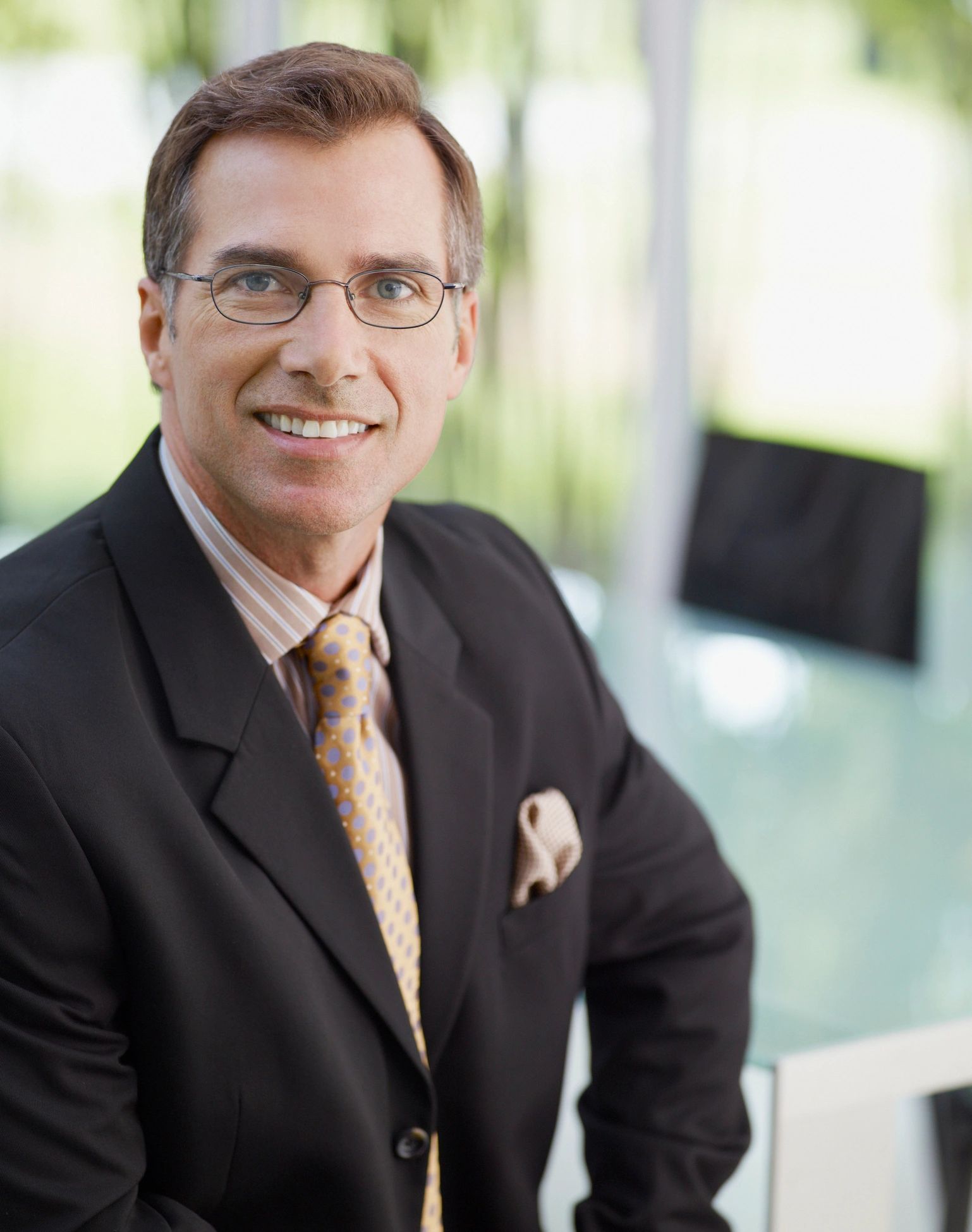 Professional executive portrait representing trusted advisory leadership